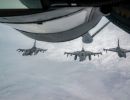 F-16 pilots, KC-135 crews team for mid-air refueling training